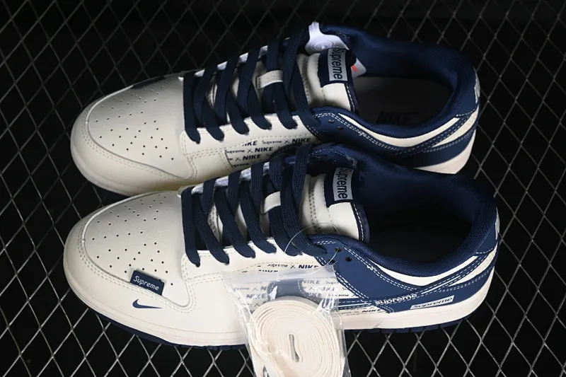 All categories Nk SB Dunk Series Nk SB Dunk Low High-end customized low-top sneakers Nike SB Dunk Low Supreme co-branded white and blue print High-end customized low-top casual sneakers XD1588-238